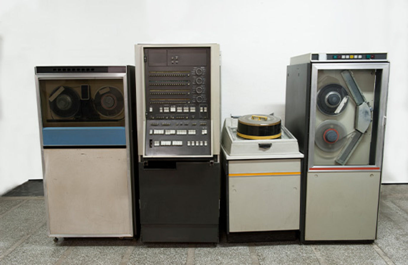 Outdated systems: A vintage computer with a floppy disk drive and a CRT monitor, symbolizing obsolete technology.